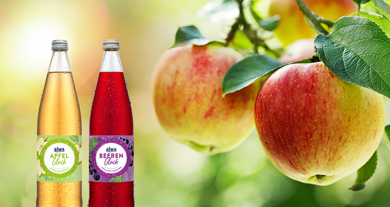 alwa Apfelschorle und Apfel-Kirsch-Schorle mit Äpfeln am Baum